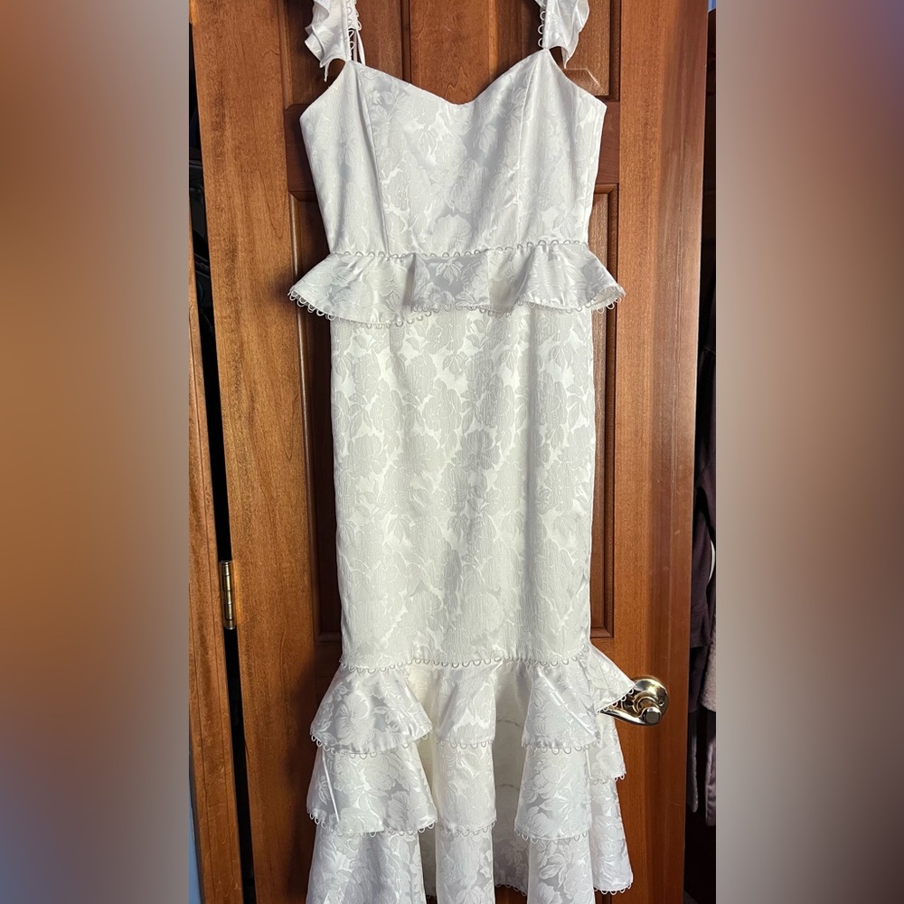 V Chapman, XS. Fitted with flare bottom